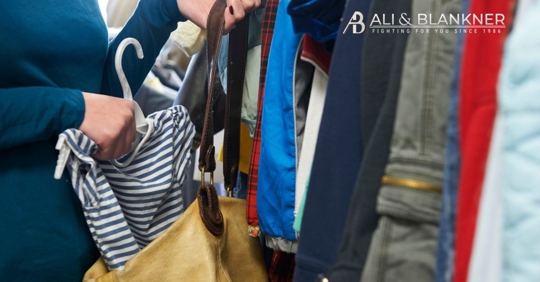 woman stealing clothes from store
